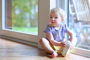 Glass door markers to prevent child injury